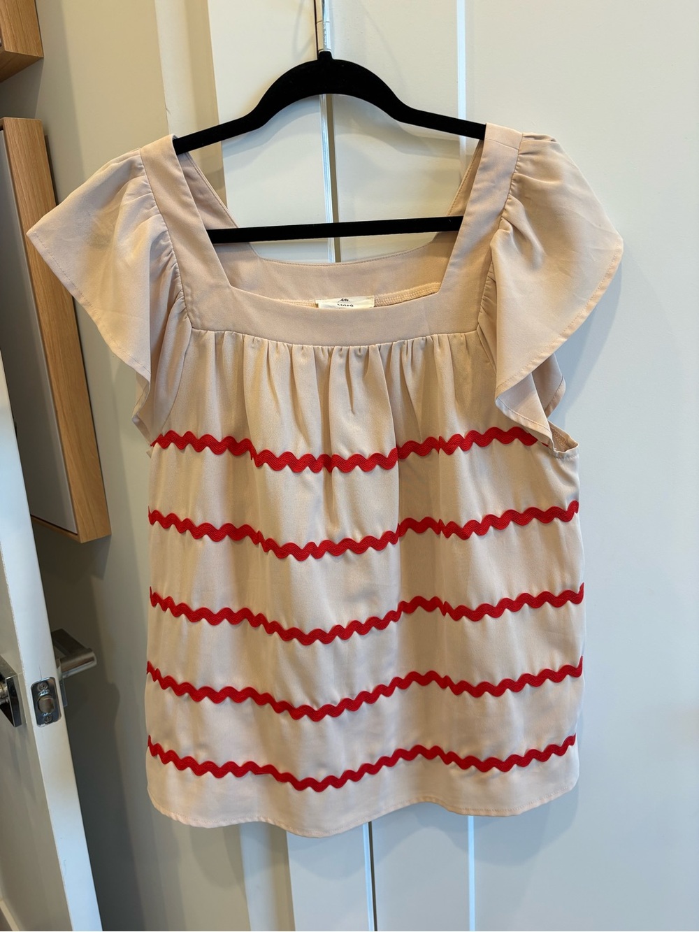 entro Beige Top with Red Ric Rac Trim